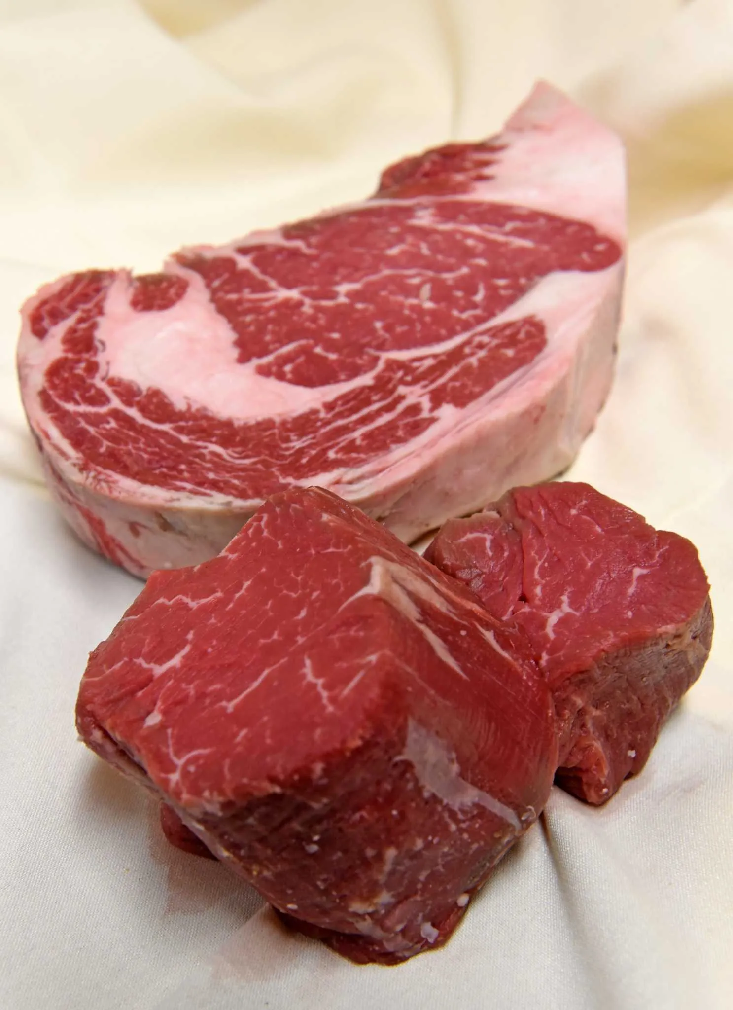 A marbled Delmonico steak and a thick-cut filet mignon at The Bear's Steakhouse
